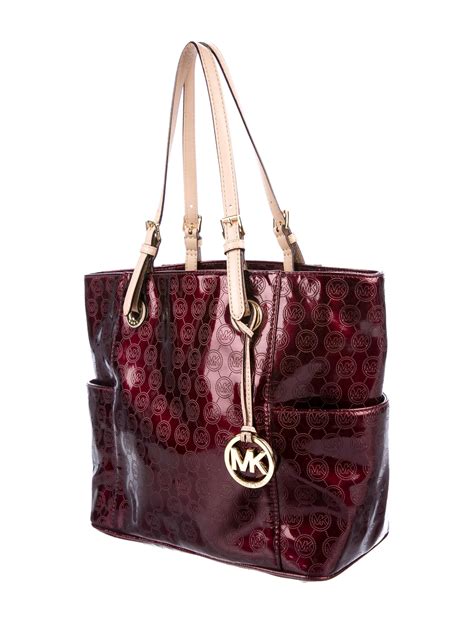 michael kors bag with compartments|Michael Kors bags official website.